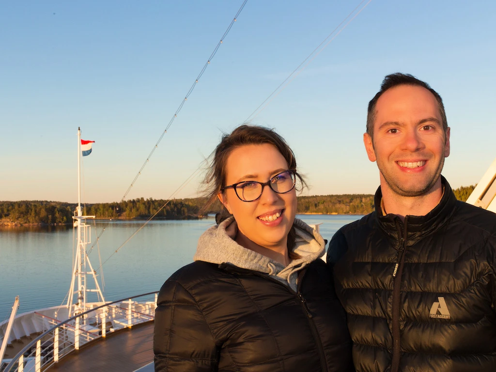 Brian & Jenna on the bow of Holland America's M.S. Rotterdam as it sails through the Swedish Archipelago.